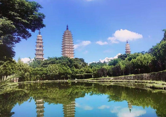 Day 6 The pagodas themselves are made of brick and covered in white mud, making them highly visible from miles away. The main pagoda was built from 823 – 840 A.D. and stands nearly 70 meters tall (230 feet) as one of the tallest pagodas in China’s long history. The 2 smaller pagodas sit at angles to the main pagoda, creating a symmetric triangle, which is unique in Buddhist sites.
 Day 6 The pagodas themselves are made of brick and covered in white mud, making them highly visible from miles away. The main pagoda was built from 823 – 840 A.D. and stands nearly 70 meters tall (230 feet) as one of the tallest pagodas in China’s long history. The 2 smaller pagodas sit at angles to the main pagoda, creating a symmetric triangle, which is unique in Buddhist sites.