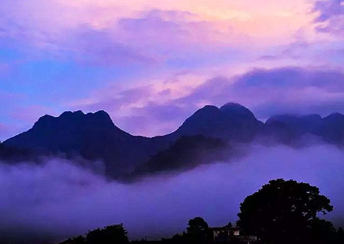 Day 3 The Western Hills of Kunming. Sometimes referred to as “Sleeping Beauty Hills” because of their alleged resemblance to a young lady lying beside the lake, this protected forest area is located about 12 kilometers (7 miles) outside of the city of Kunming.  Day 3 The Western Hills of Kunming. Sometimes referred to as “Sleeping Beauty Hills” because of their alleged resemblance to a young lady lying beside the lake, this protected forest area is located about 12 kilometers (7 miles) outside of the city of Kunming.